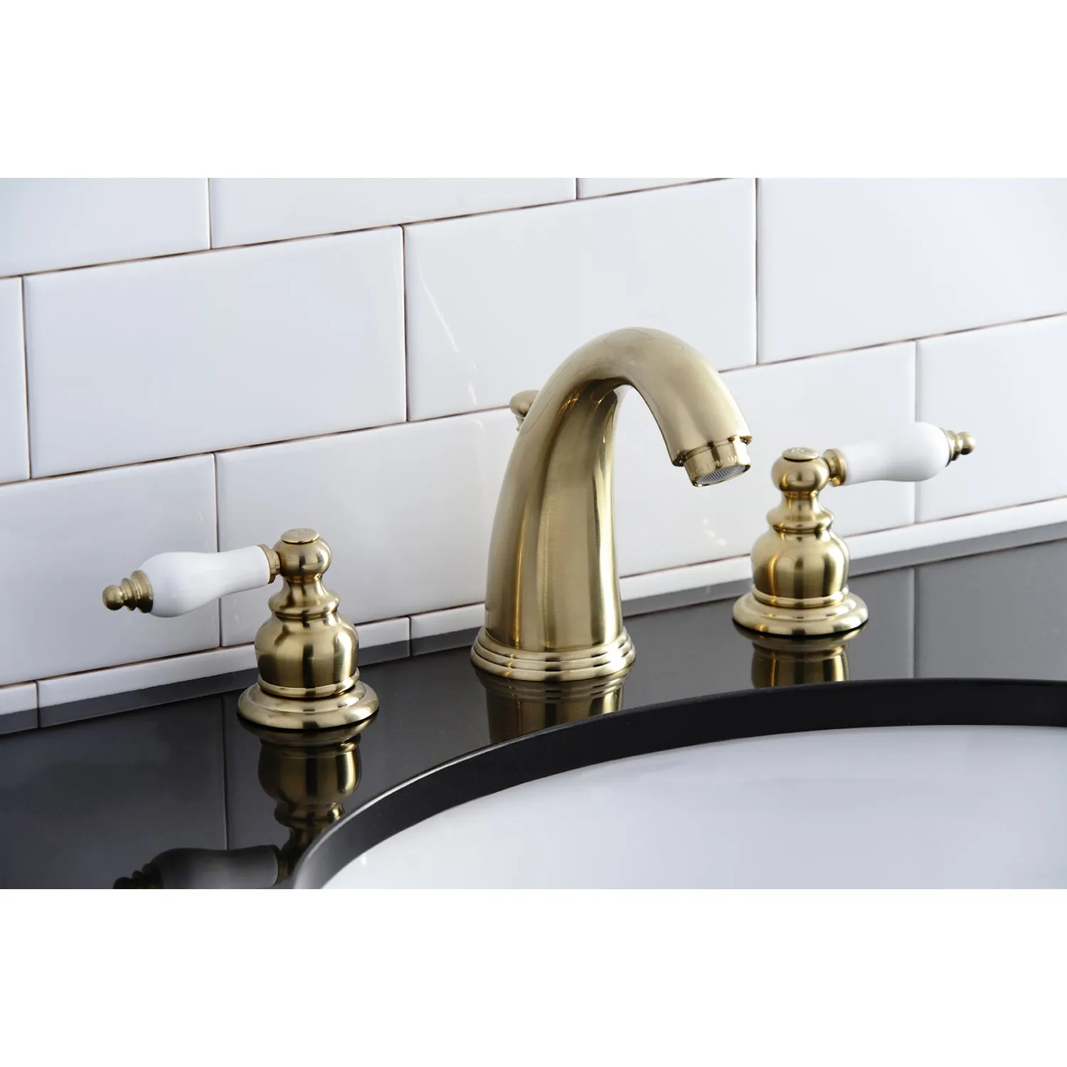 Victorian Two Handle 8 In. Two-handle 3-Hole Deck Mount Widespread Bathroom Sink Faucet